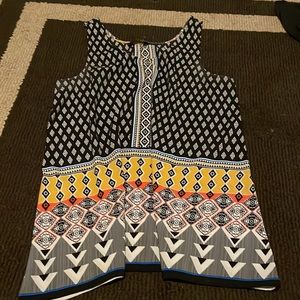 Gently used printed tank top.